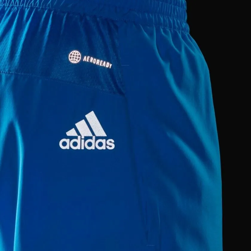 adidas blue running shorts with reflective pockets for men. Ideal for fitness, gym, and sports.