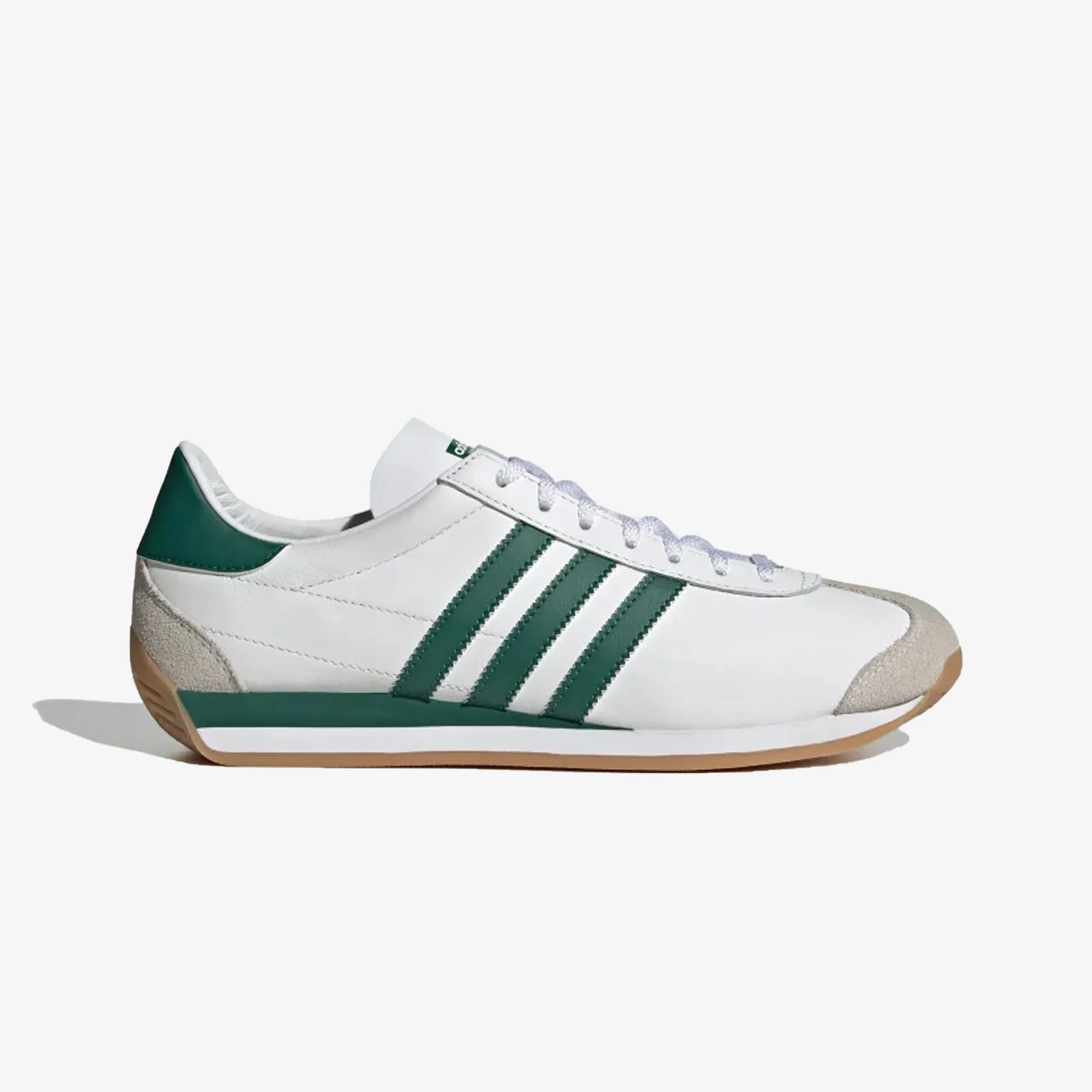 OG Trainers in White/Green color.