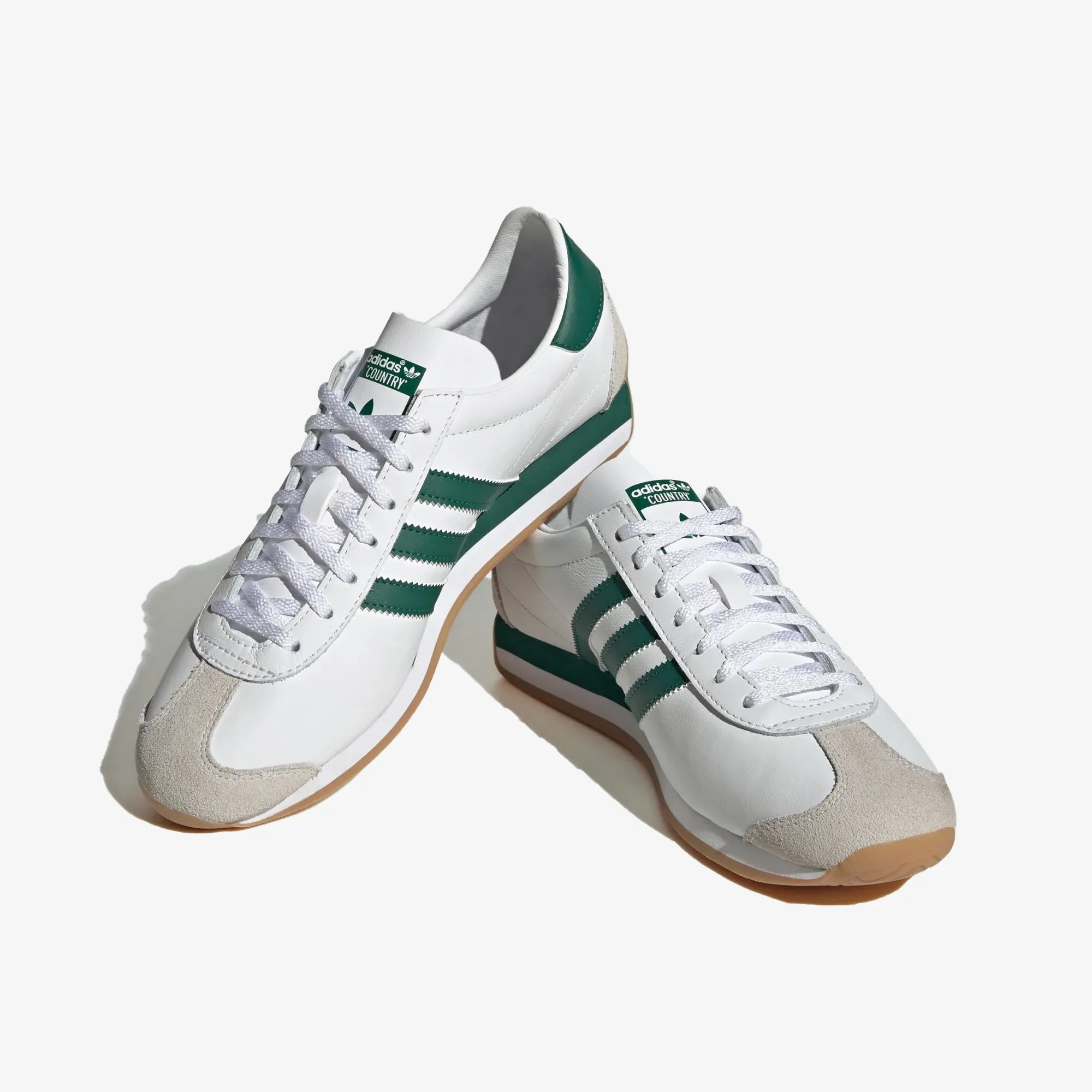 OG Trainers in White/Green color.