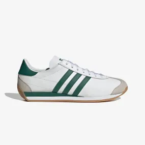 OG Trainers in White/Green color.