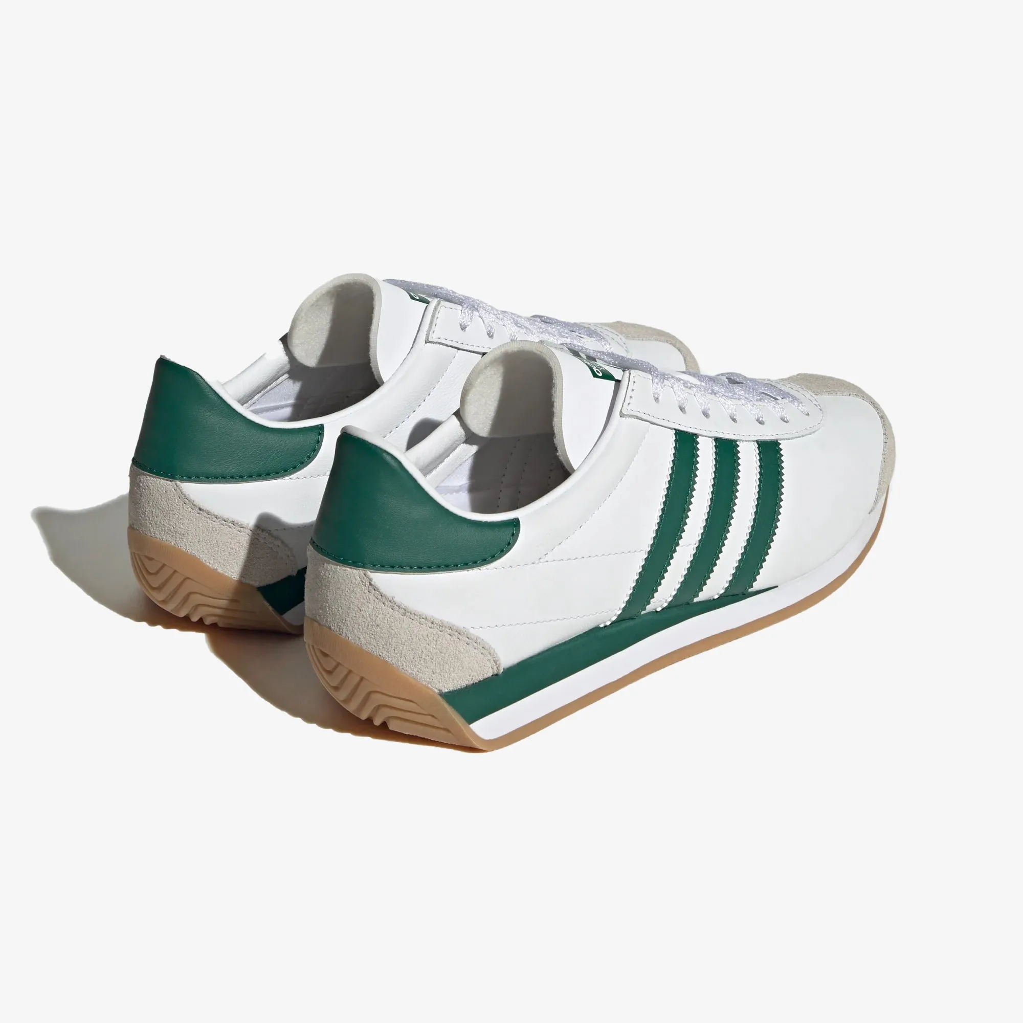 OG Trainers in White/Green color.