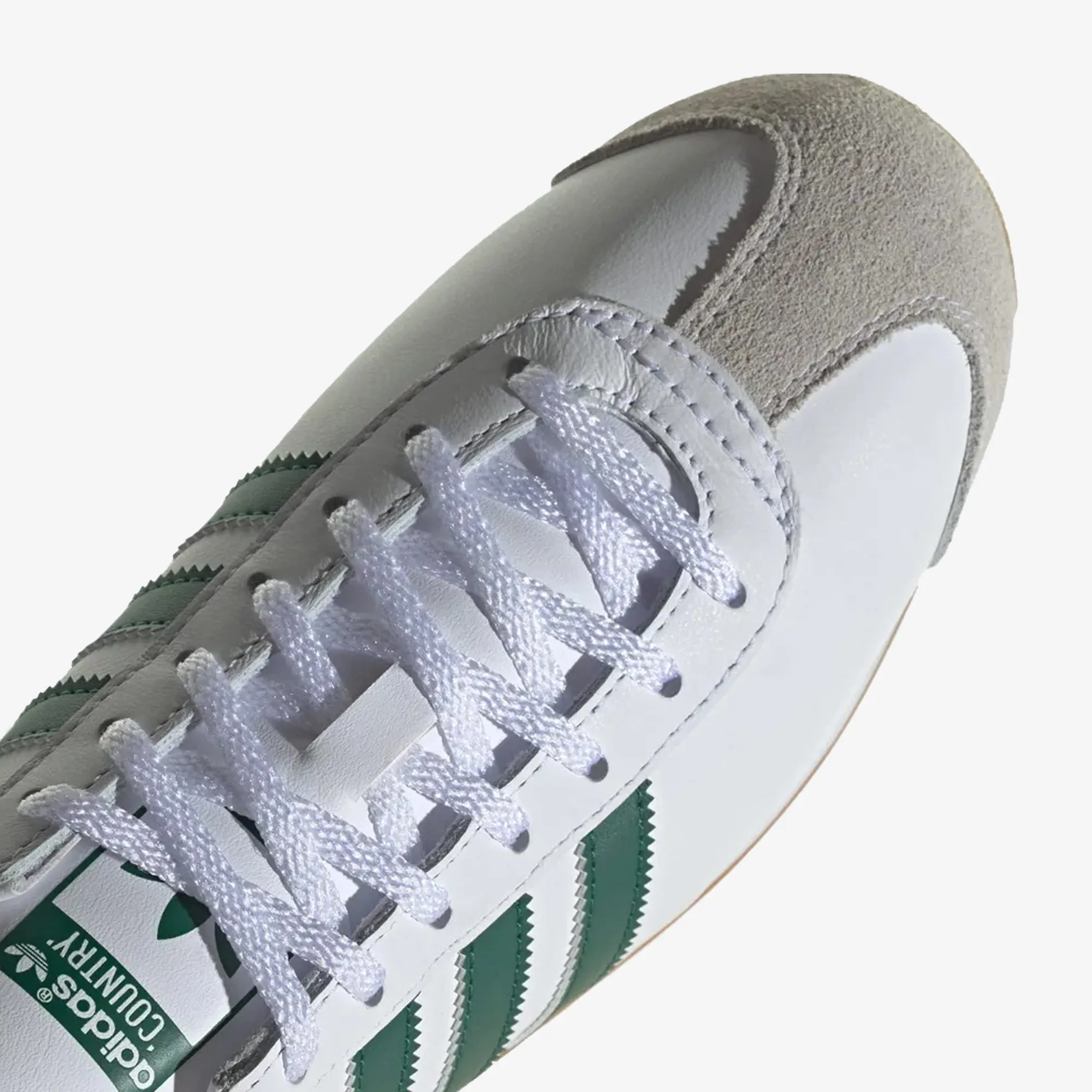 OG Trainers in White/Green color.