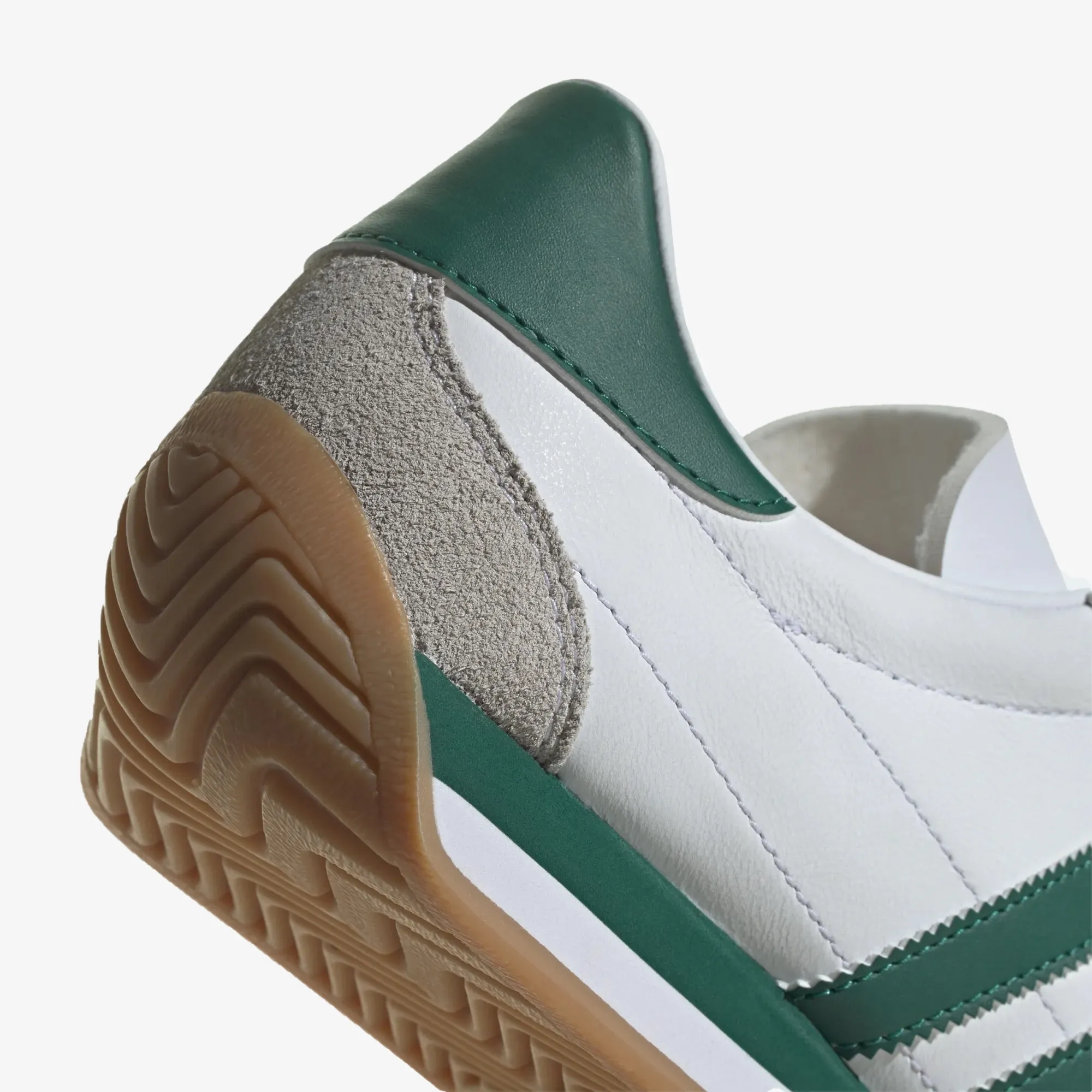 OG Trainers in White/Green color.