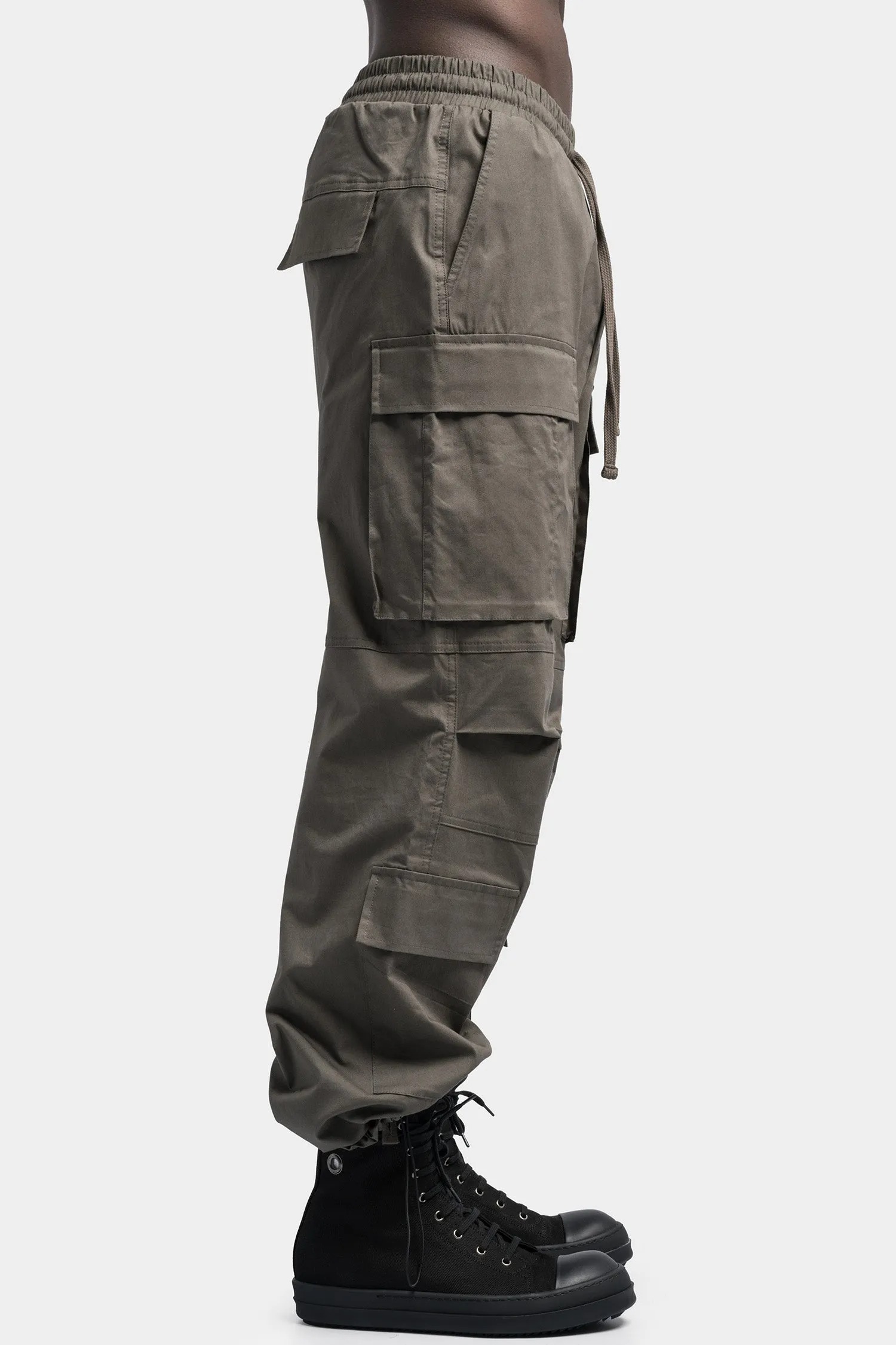 Oversized cargo trousers in a vibrant shade of Ivy green.