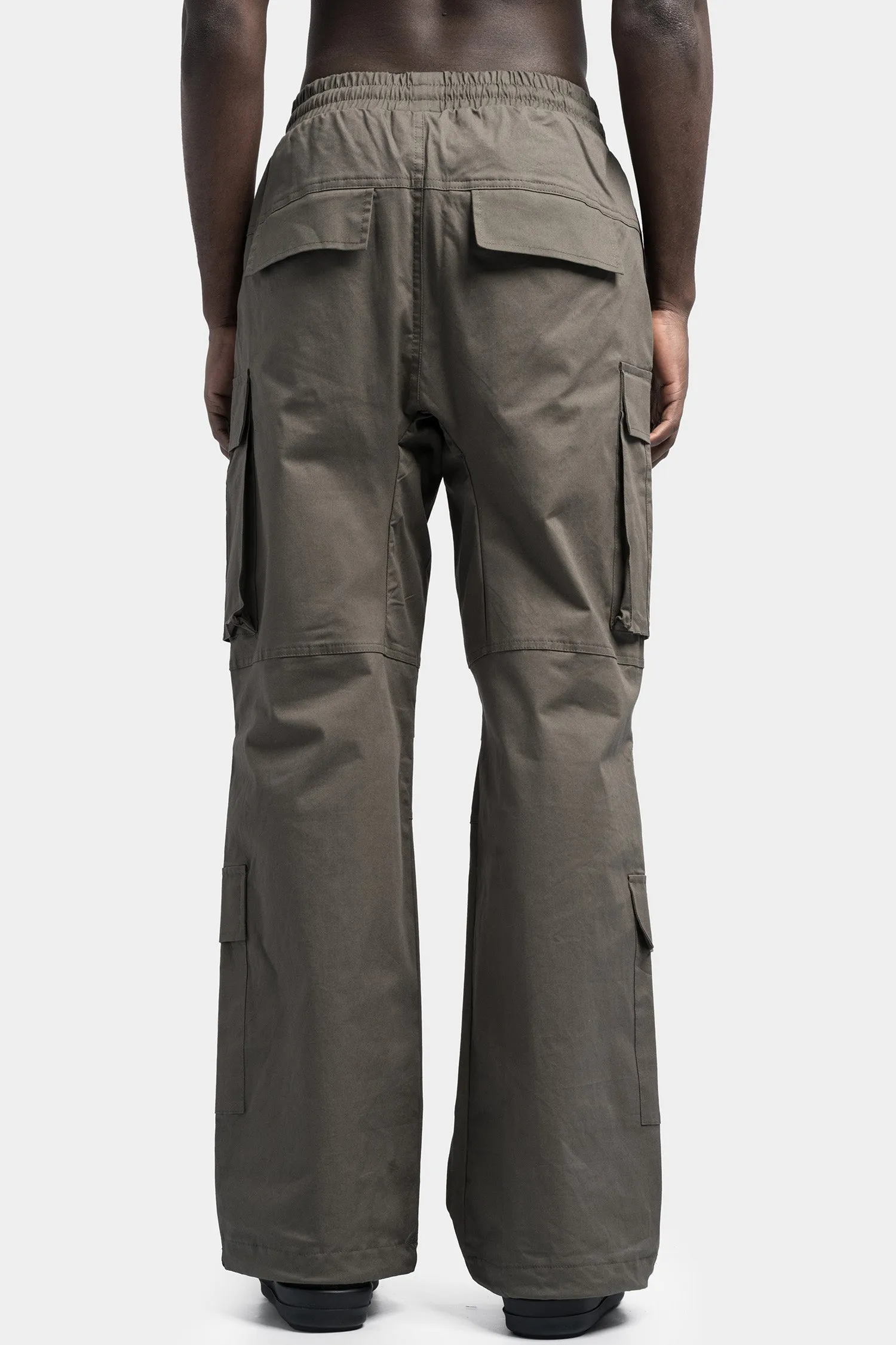 Oversized cargo trousers in a vibrant shade of Ivy green.