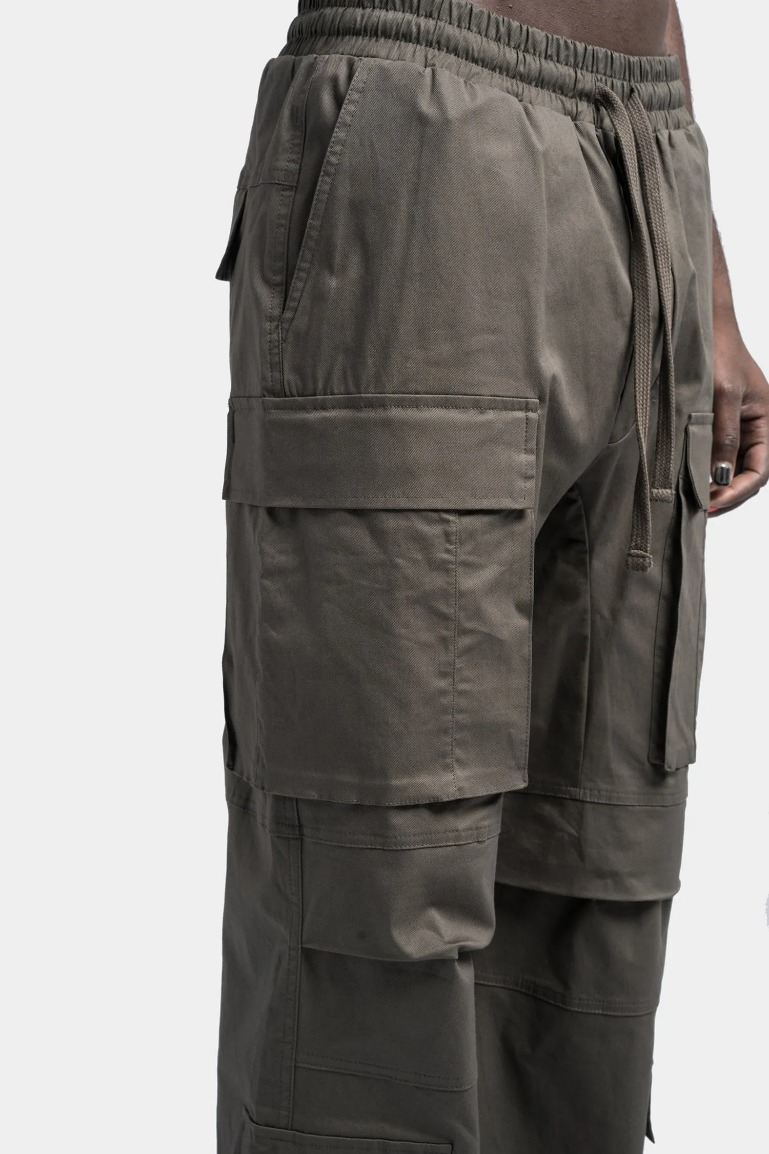 Oversized cargo trousers in a vibrant shade of Ivy green.