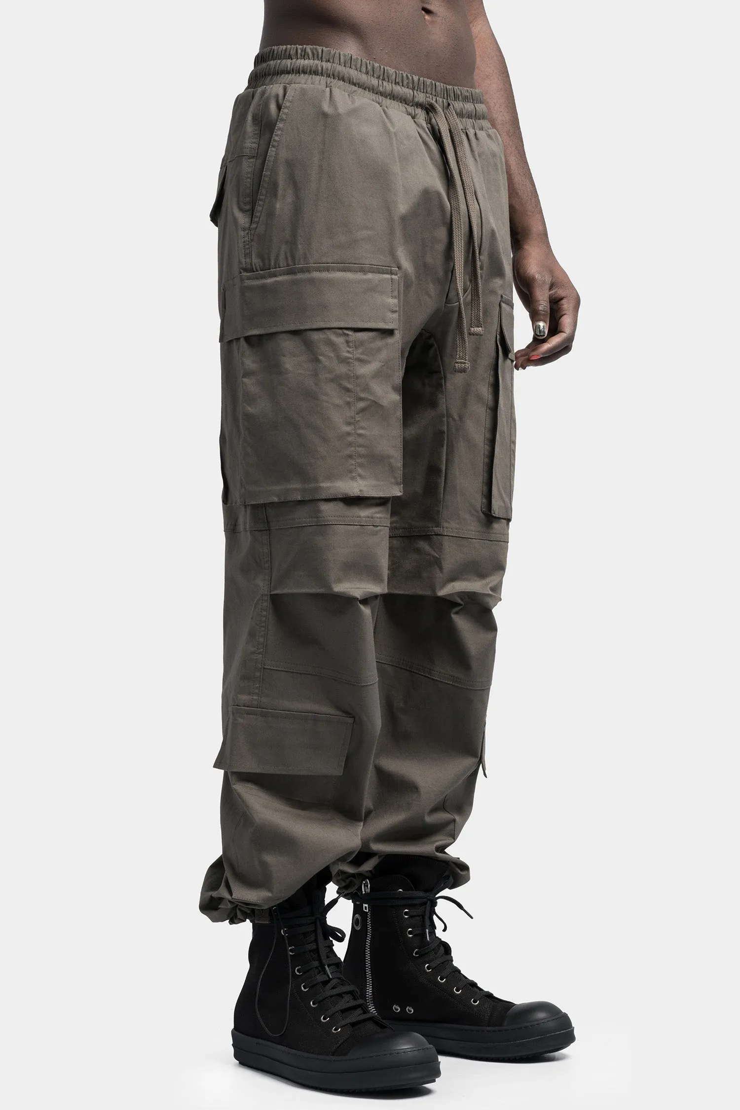 Oversized cargo trousers in a vibrant shade of Ivy green.