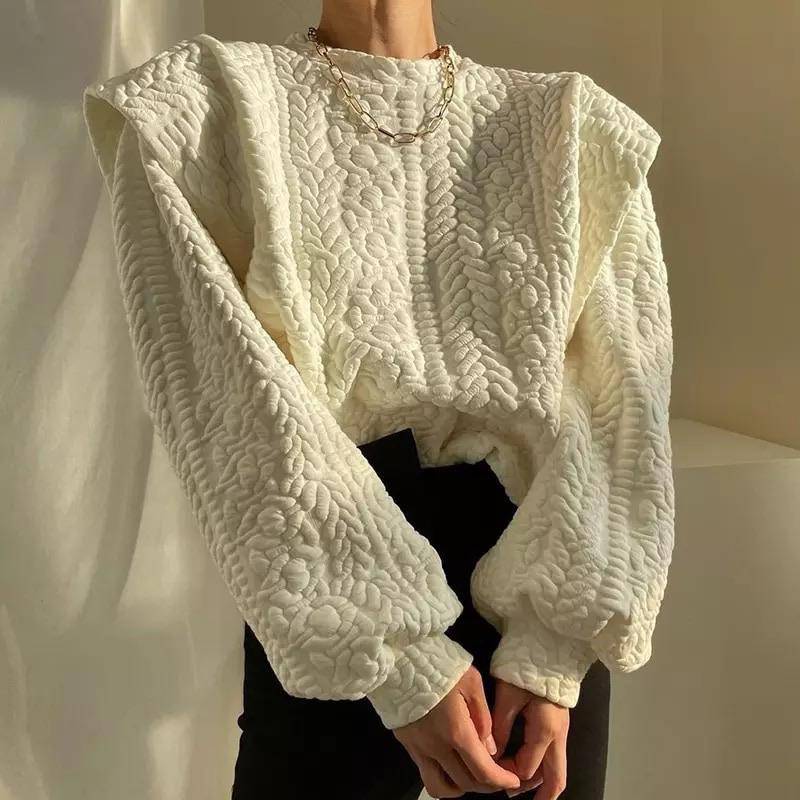 Patterned scoop neck sweater with exaggerated shoulder