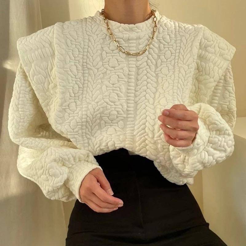 Patterned scoop neck sweater with exaggerated shoulder