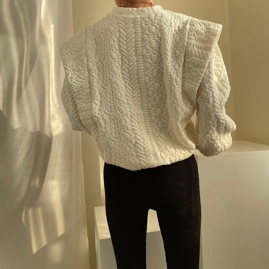 Patterned scoop neck sweater with exaggerated shoulder