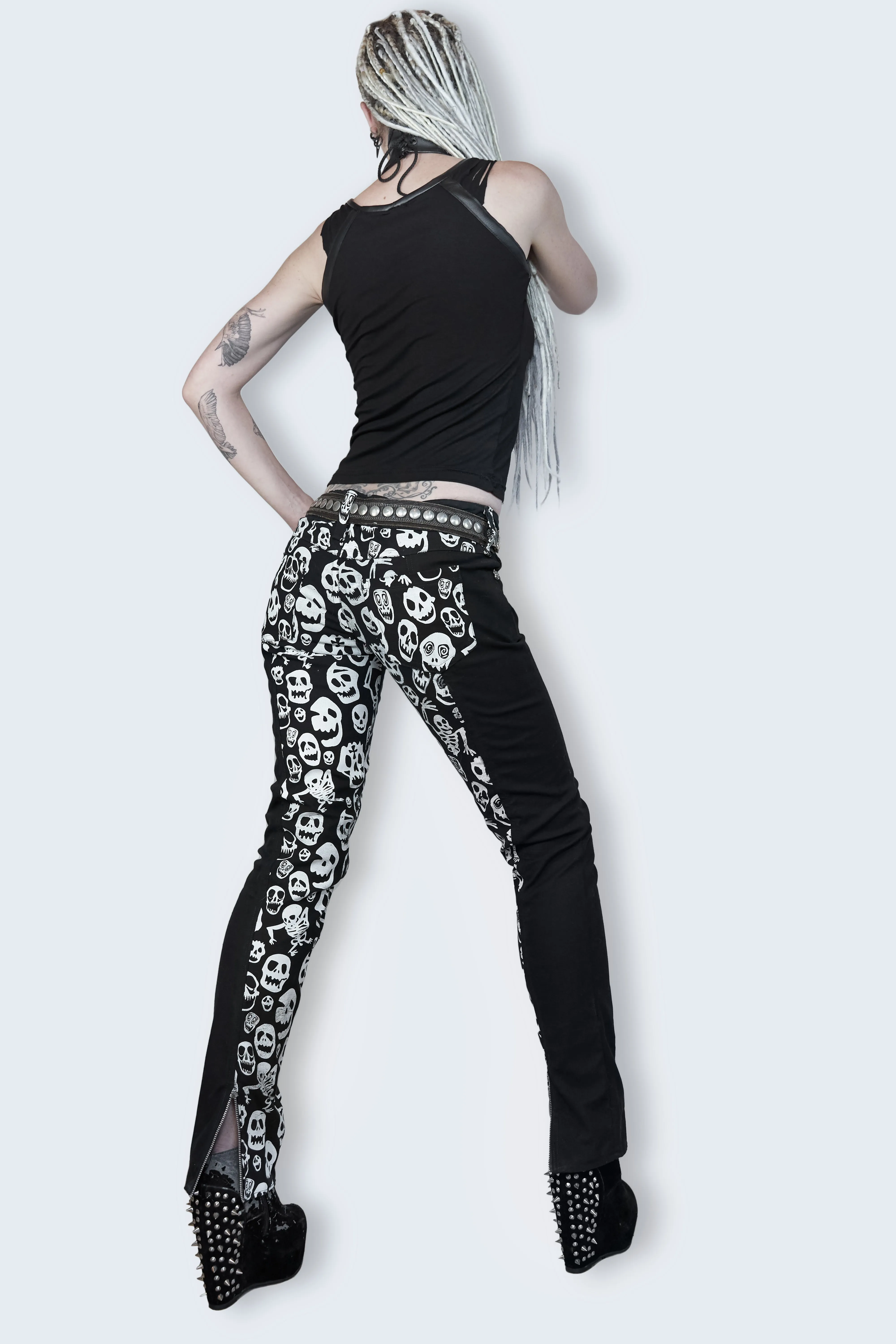 Skellington skull print ankle zip jeans, black and white, skinny fit.