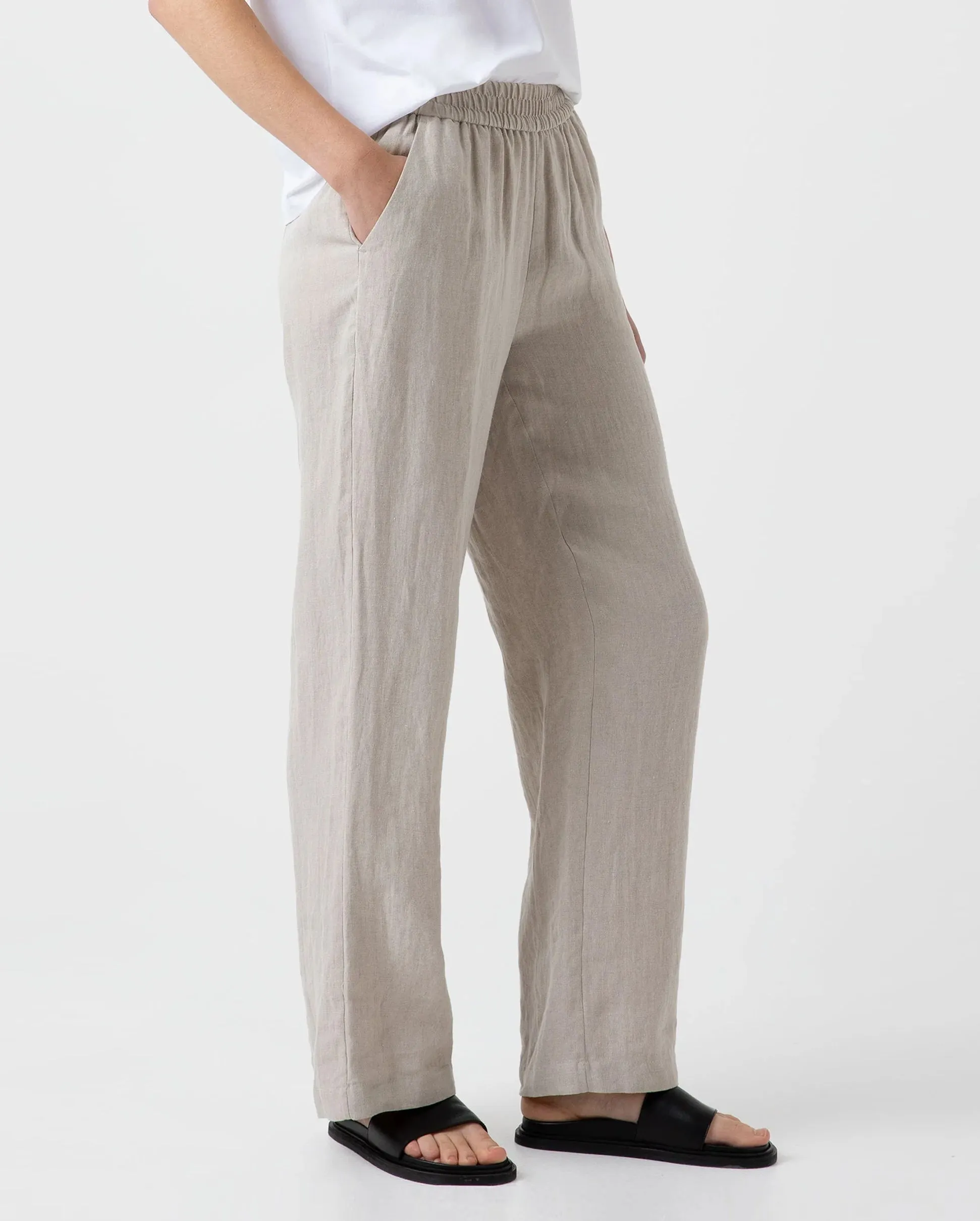 Wide leg trousers with drawstring in light sand color.